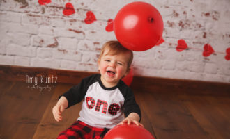 one year old boy during his photo shoot with liberty photographer