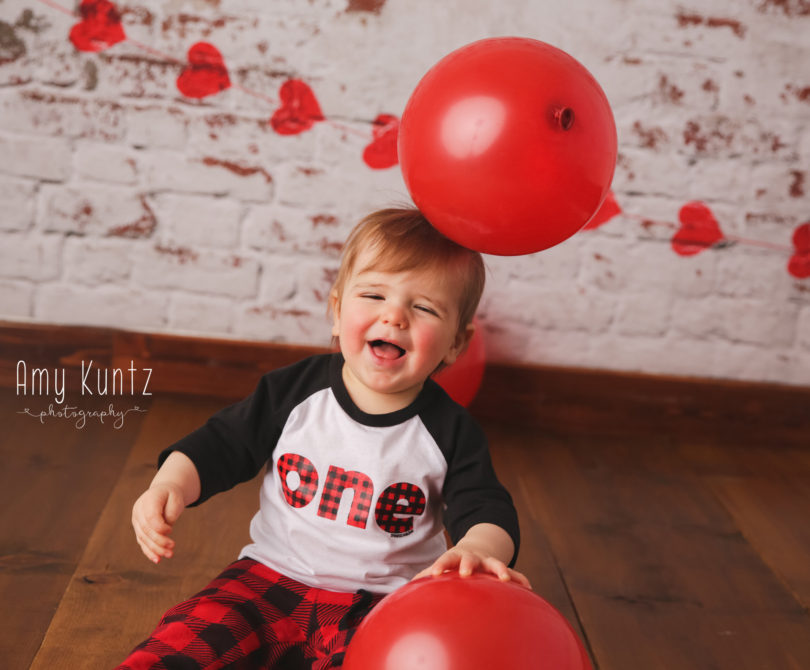 one year old boy during his photo shoot with liberty photographer